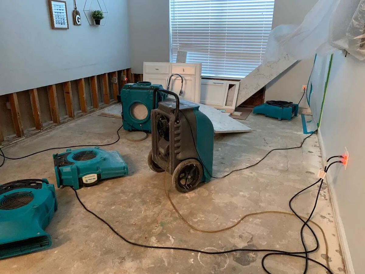 Dehumidifier in flood-cut room for Water Damage Restoration in Cornelia